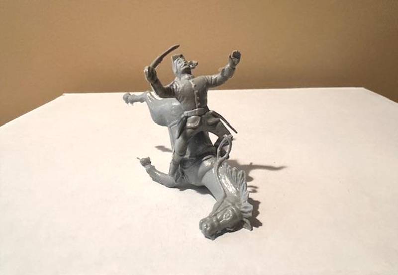 Marx falling horse and rider gray rider with a gray horse