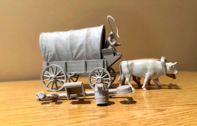 Marx Ox Drawn covered wagon with oxen plus drive with whip (in gray) wagon in gray with gray top