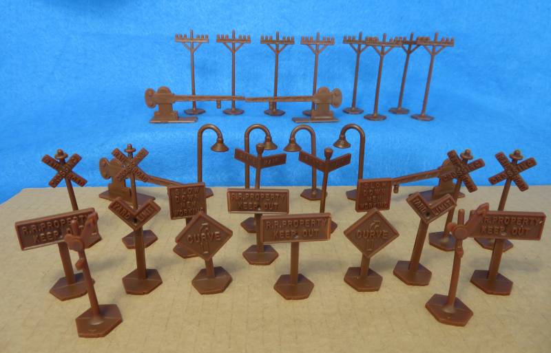 RailRoad accessories (brown) signs, street lights, etc....36 pieces (45mm)  